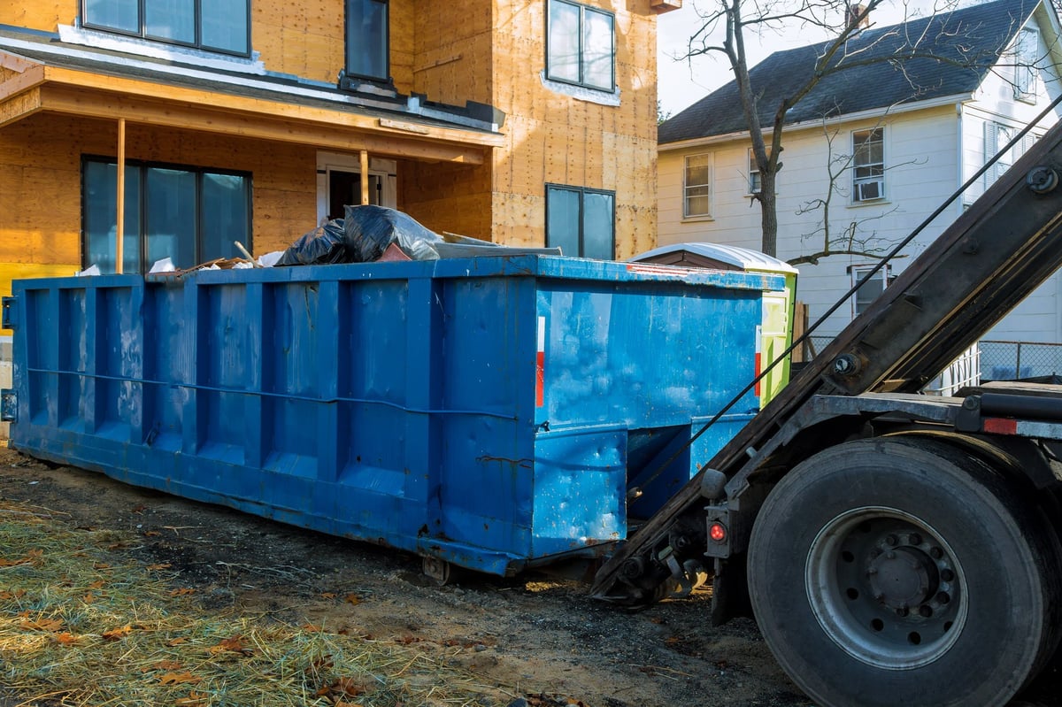Recycling dumpsters used to separate materials before disposal